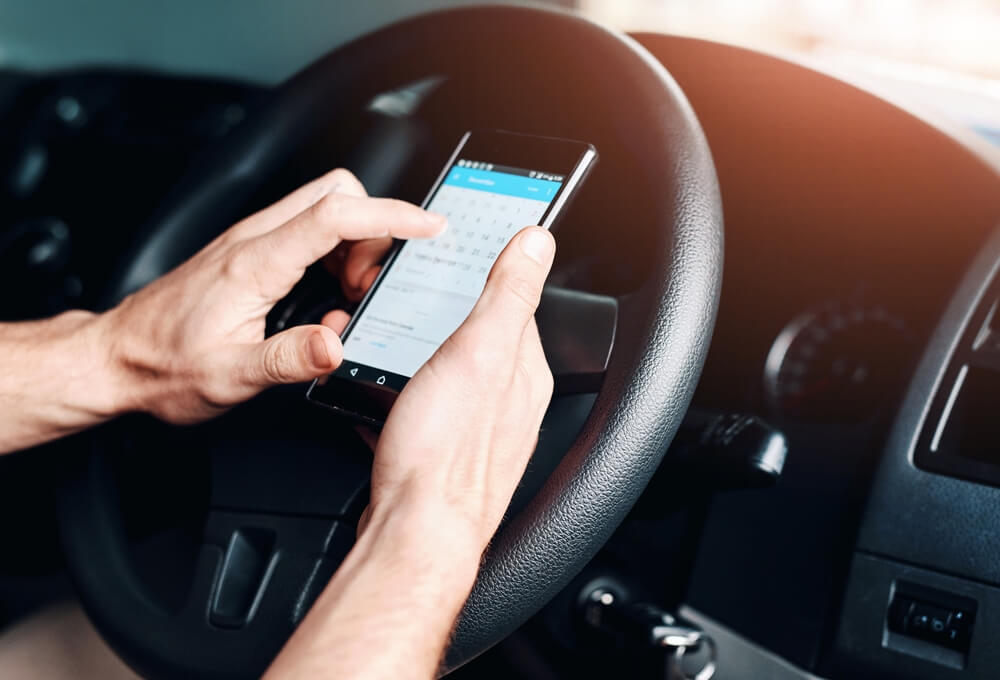 Car, Phone and Hands Of Person with calendar for schedule.